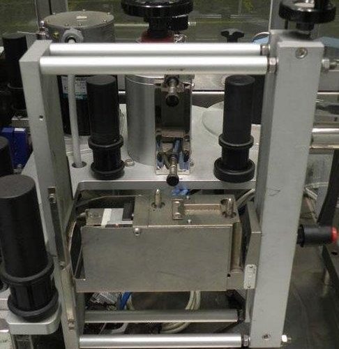 Neri Model SL400 Pressure Sensitive Wraparound Bottle Labeler