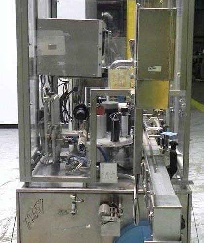 Neri Model SL400 Pressure Sensitive Wraparound Bottle Labeler
