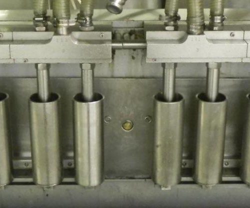 Cozzoli Model LF840 8 Head Inline Continuous Motion Walking Beam Style Piston Filler