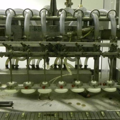 Cozzoli Model LF840 8 Head Inline Continuous Motion Walking Beam Style Piston Filler