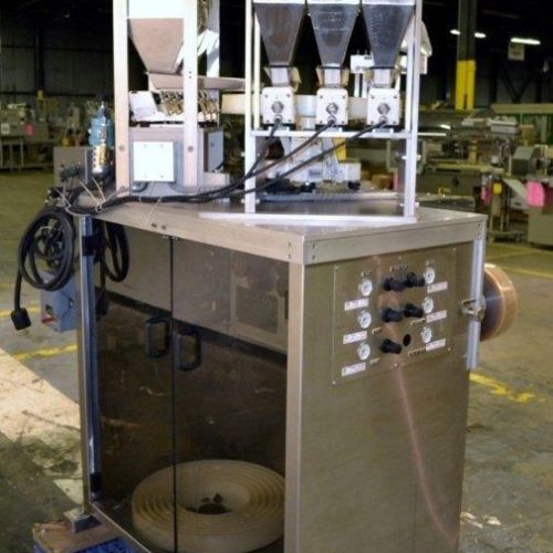 WrapAde Model TT4 Vertical Strip Packager w/6 tablets or capsule hoppers