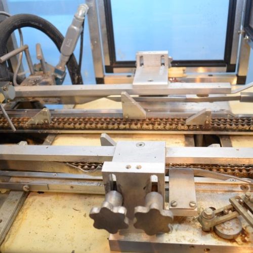 Adco Model 15DCTEC 6.25 in Pitch Manual Load Horizontal Hot Melt Cartoner