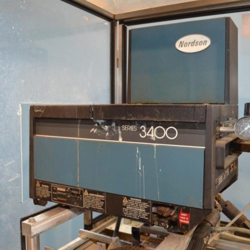 Adco Model 15DCTEC 6.25 in Pitch Manual Load Horizontal Hot Melt Cartoner