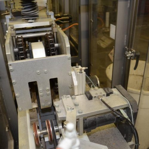 PMI Packaging Model HS312 12 in Pitch Horiz WrapAround 60 PPM Sleever