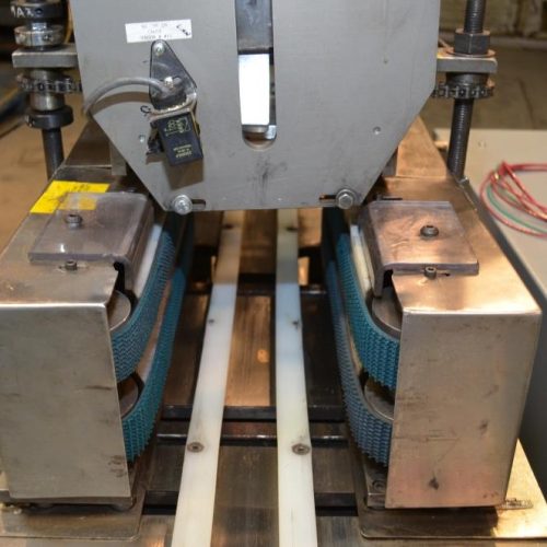 Holmatic S/S Overcapper Currently Set For 603 Lids With Holmatic SM1000 Lid Feeder