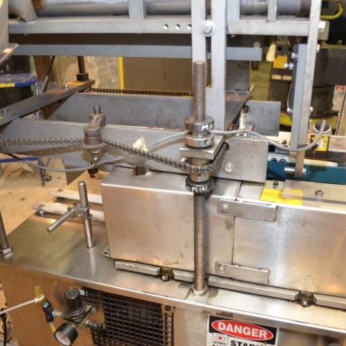 Holmatic S/S Overcapper Currently Set For 603 Lids With Holmatic SM1000 Lid Feeder
