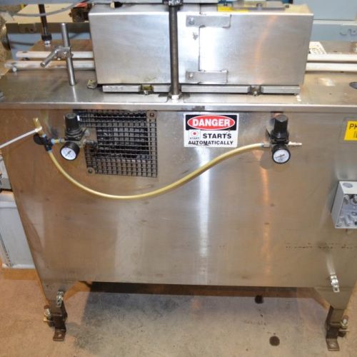 Holmatic S/S Overcapper Currently Set For 603 Lids With Holmatic SM1000 Lid Feeder