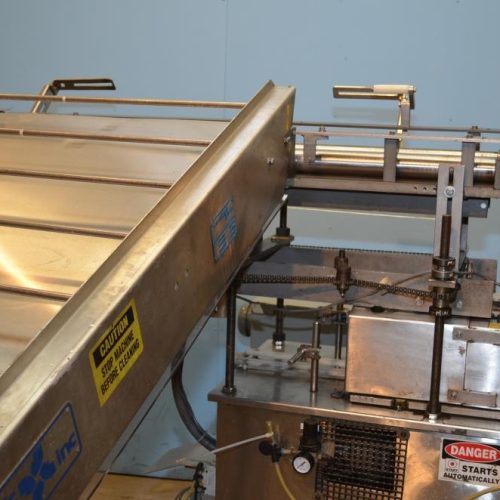 Holmatic S/S Overcapper Currently Set For 603 Lids With Holmatic SM1000 Lid Feeder