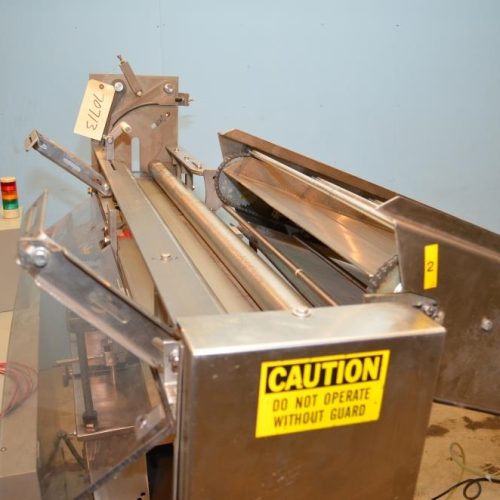 Holmatic S/S Overcapper Currently Set For 603 Lids With Holmatic SM1000 Lid Feeder