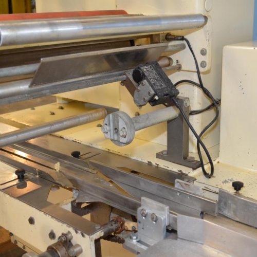 Doboy Model J 400 PPM Horizontal Flow Through Wrapper with Vacuum Placer