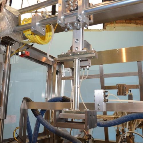 Adco Model AFCX351SS S/S 40 CPM Top Load Hot Melt Carton Erector and Conveyor