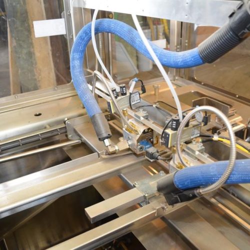 Adco Model AFCX351SS S/S 40 CPM Top Load Hot Melt Carton Erector and Conveyor