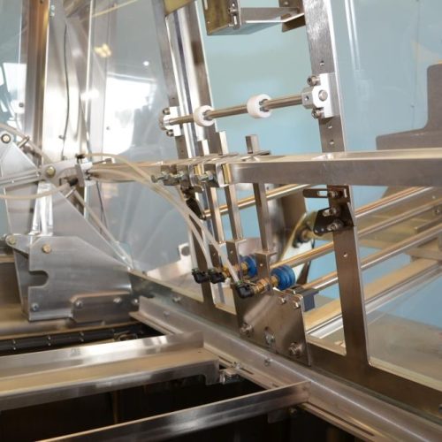 Adco Model AFCX351SS S/S 40 CPM Top Load Hot Melt Carton Erector and Conveyor