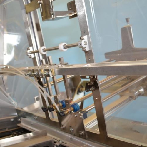 Adco Model AFCX351SS S/S 40 CPM Top Load Hot Melt Carton Erector and Conveyor