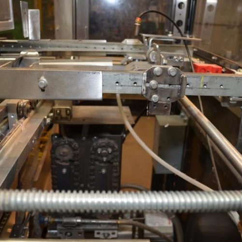 Adco Model HCF35PC Automatic Hot Melt Top Load Carton Former