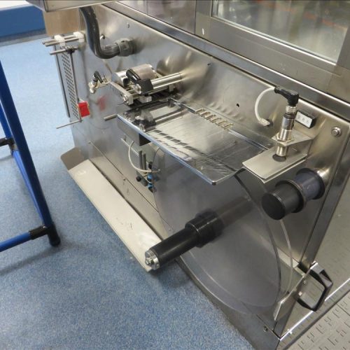 Neri Model RL500 Pressure Sensitive Wraparound Trunion Vial/Ampoule Labeler