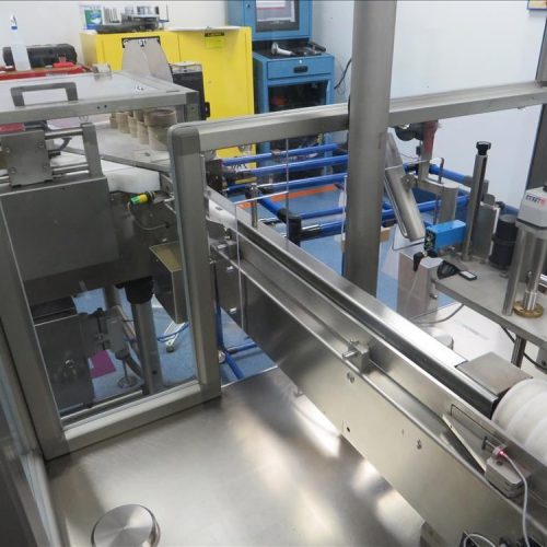 Neri Model RL500 Pressure Sensitive Wraparound Trunion Vial/Ampoule Labeler