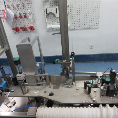 Neri Model RL500 Pressure Sensitive Wraparound Trunion Vial/Ampoule Labeler