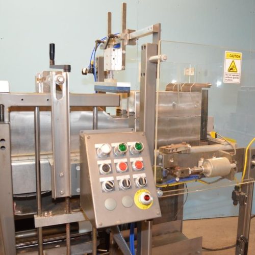 Combi Model DP200 Auto Drop Packer with Oscillating Infeed and E-2500 RH Case Erector
