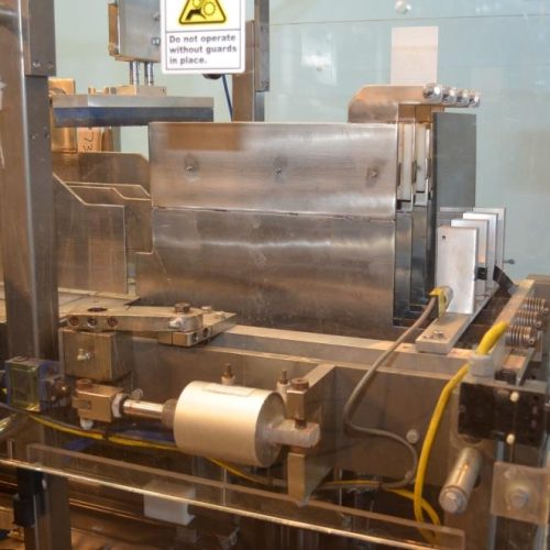 Combi Model DP200 Auto Drop Packer with Oscillating Infeed and E-2500 RH Case Erector