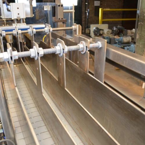 Combi Model DP200 Auto Drop Packer with Oscillating Infeed and E-2500 RH Case Erector