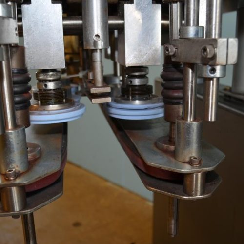 CLI Unicap100 (6) Quill S/S Inline 120 CPM Spindle Capper with S/S Cap Elevator