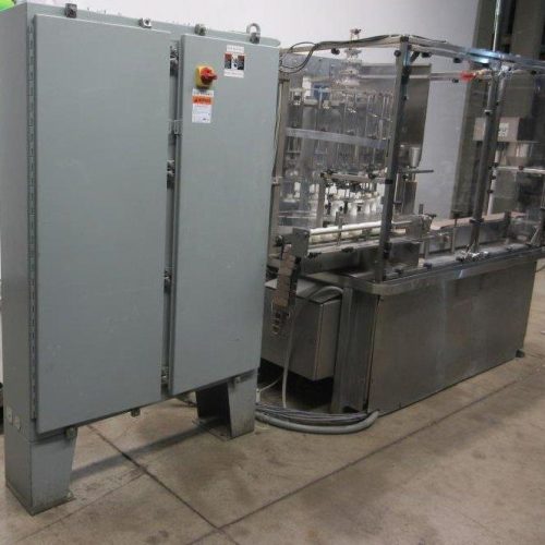 MRM Elgin (Cozzoli) Model RPF24 (24) Head Rotary 220 ppm Piston Filler