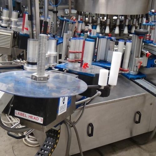 P E Model 24T8254S2E (24) Head Rotary Front and Back PS Labeler on 4.5 in Pitch