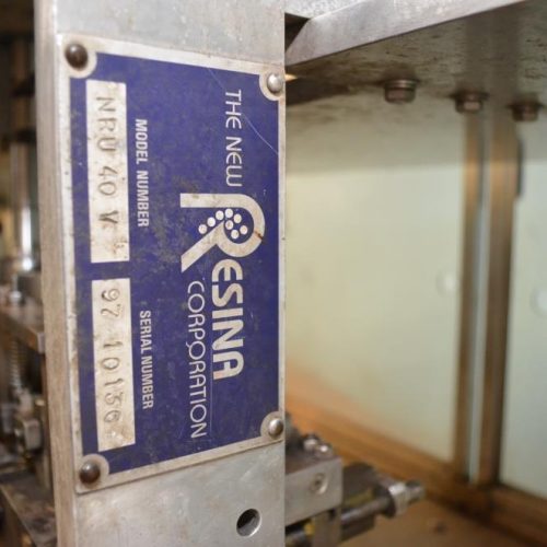 Resina Model NRU40 (8) Quill Inline Spindle Capper with Cap Orientor and Hopper