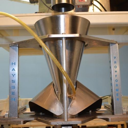 Hayssen 1216HR 60 ppm VFFS with Speedee Volumetric Filler and Registration and Coder