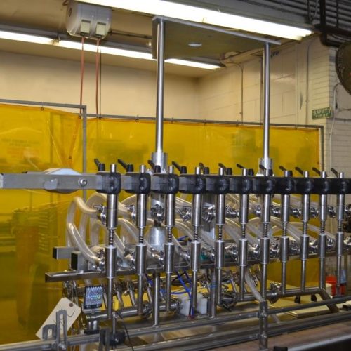 Inline Filling System Model IFSFOF12, (12) Head S/S Inline Overflow Liquid Filler