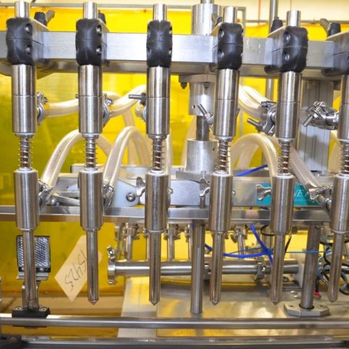 Inline Filling System Model IFSFOF12, (12) Head S/S Inline Overflow Liquid Filler