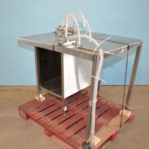 Filamatic Model DAB100 (4) Head Bench Top Inline Piston Filler with 12 Pumps
