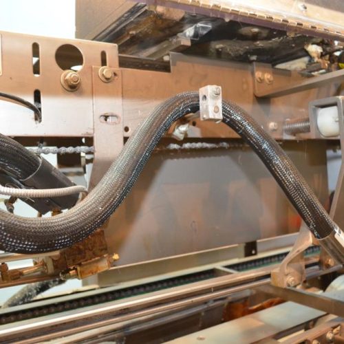 Rockford Midland Model FHM 20 CPM Top and Bottom Hot Melt Case Sealer