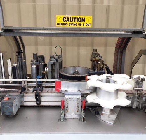 Trine Model 4500 Roll-Fed Wrap Around Hot Melt Labeler