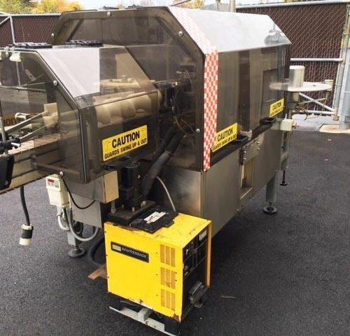 Trine Model 4500 Roll-Fed Wrap Around Hot Melt Labeler