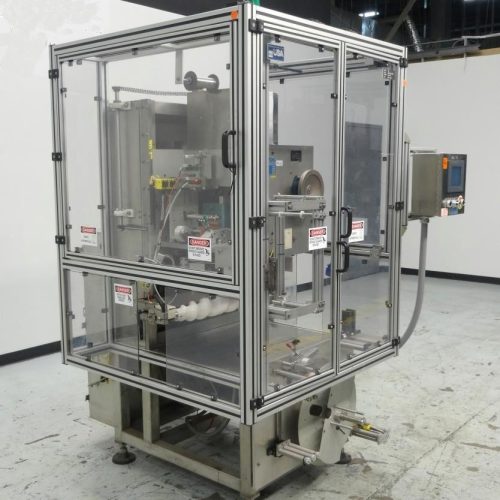 PDC Model 75-ERL Automatic Shrink Sleeve Labeler and Tamper Evident Neck Bander