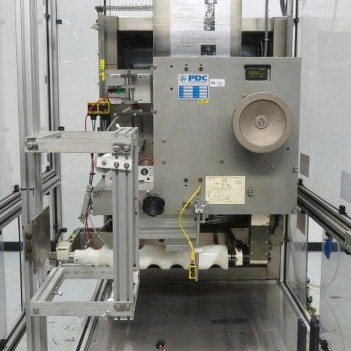 PDC Model 75-ERL Automatic Shrink Sleeve Labeler and Tamper Evident Neck Bander