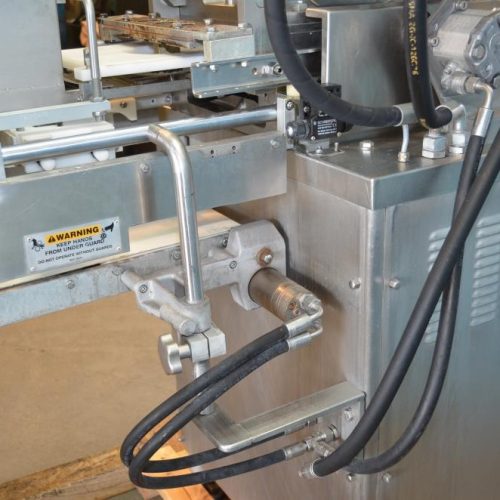 Nutec Model 720 Patty Former 7,800 PPH with Paper Inserter