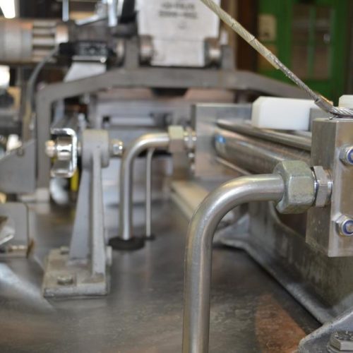 Nutec Model 720 Patty Former 7,800 PPH with Paper Inserter