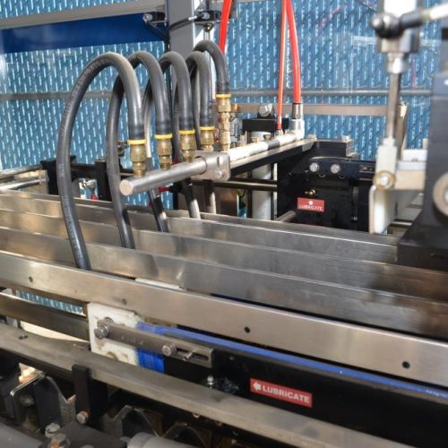 Hartness Model 835 30 CPM Drop Case Packer with Oscillating High Speed Laner