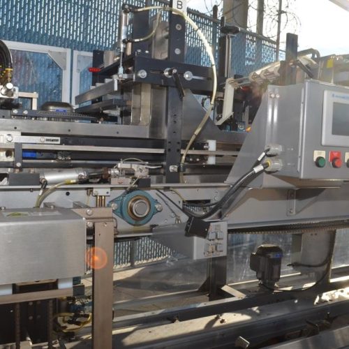 Hartness Model 835 30 CPM Drop Case Packer with Oscillating High Speed Laner