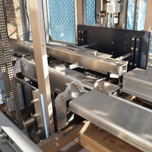 Hartness Model 835 30 CPM Drop Case Packer with Oscillating High Speed Laner