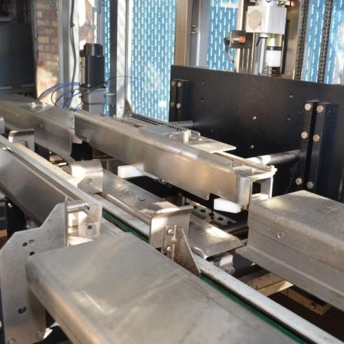 Hartness Model 835 30 CPM Drop Case Packer with Oscillating High Speed Laner