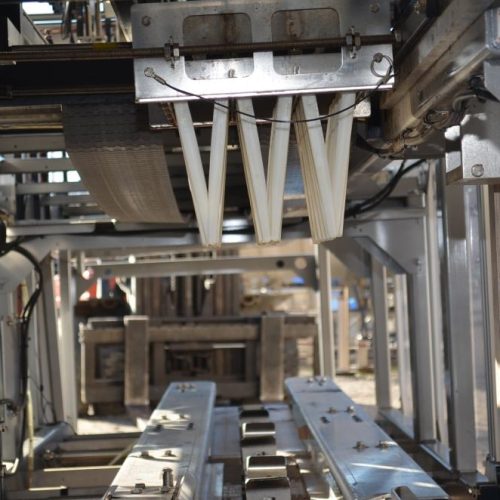 Hartness Model 835 30 CPM Drop Case Packer with Oscillating High Speed Laner