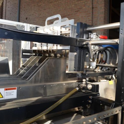 Hartness Model 835 30 CPM Drop Case Packer with Oscillating High Speed Laner