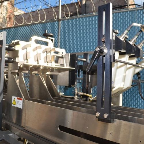 Hartness Model 835 30 CPM Drop Case Packer with Oscillating High Speed Laner