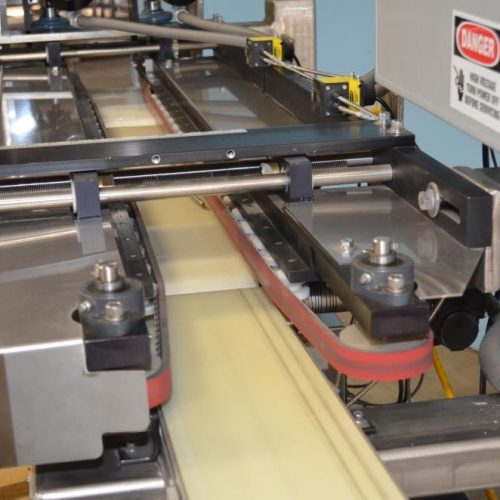 QLC High Speed Servo Driven Bottom Labeler with Label Aire 3115 Redundant Heads