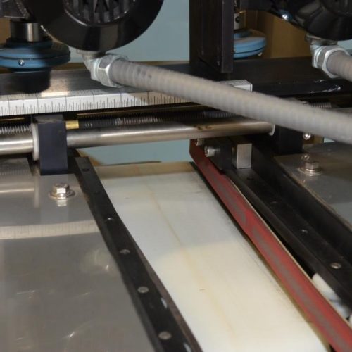 QLC High Speed Servo Driven Bottom Labeler with Label Aire 3115 Redundant Heads