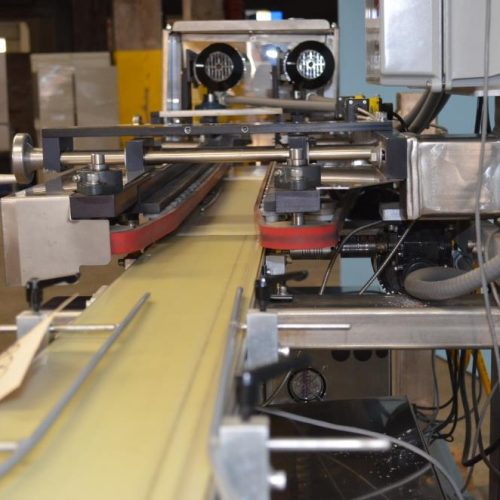 QLC High Speed Servo Driven Bottom Labeler with Label Aire 3115 Redundant Heads